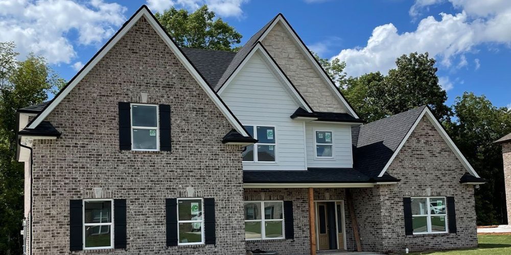 7 Ideas for Black Gutters on a Brick House